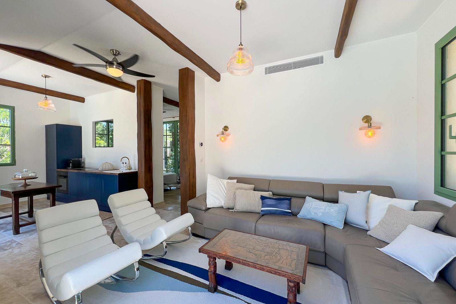Living room in the pool house with kitchen