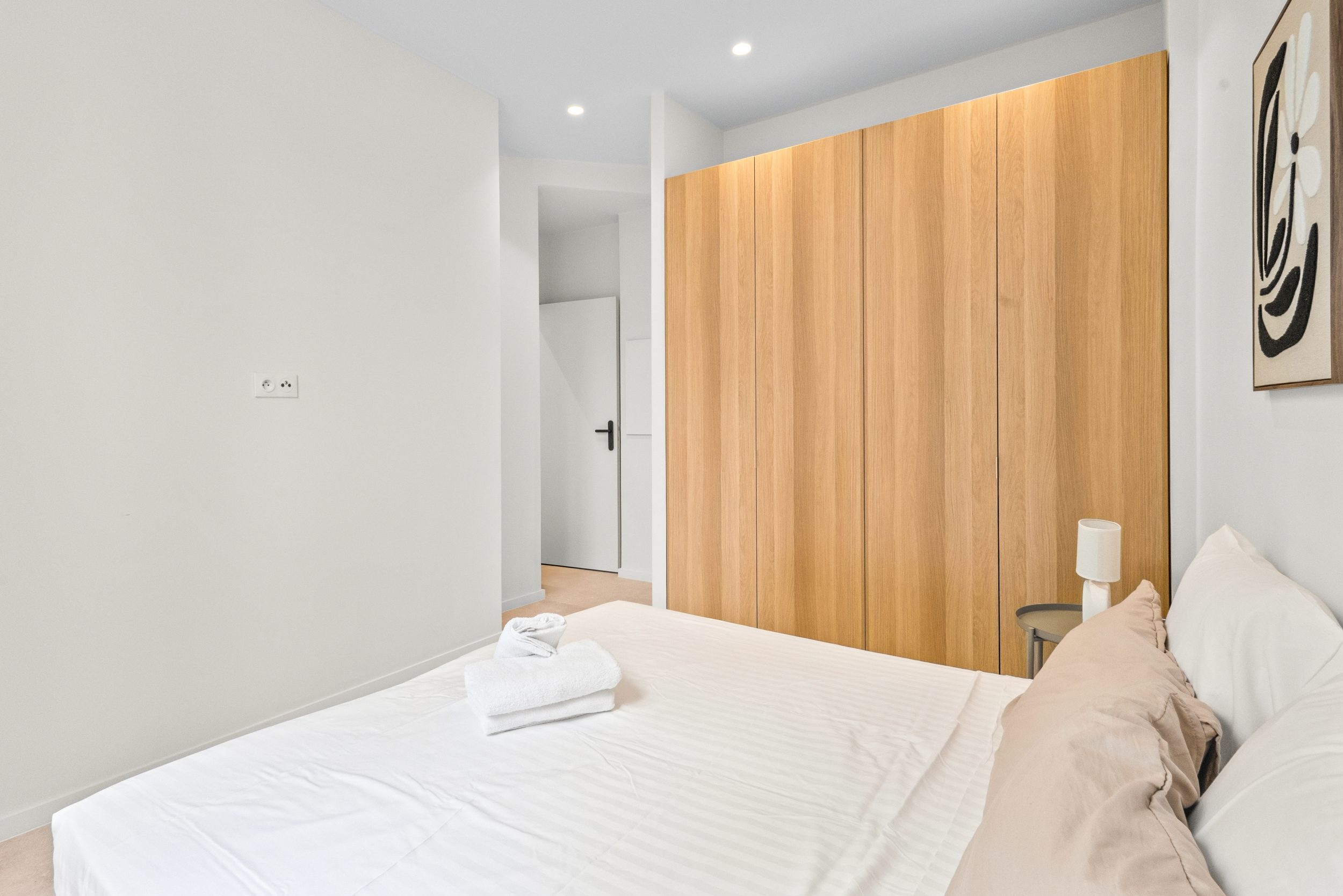 Appartement la Peyrière - Chambre avec rangement