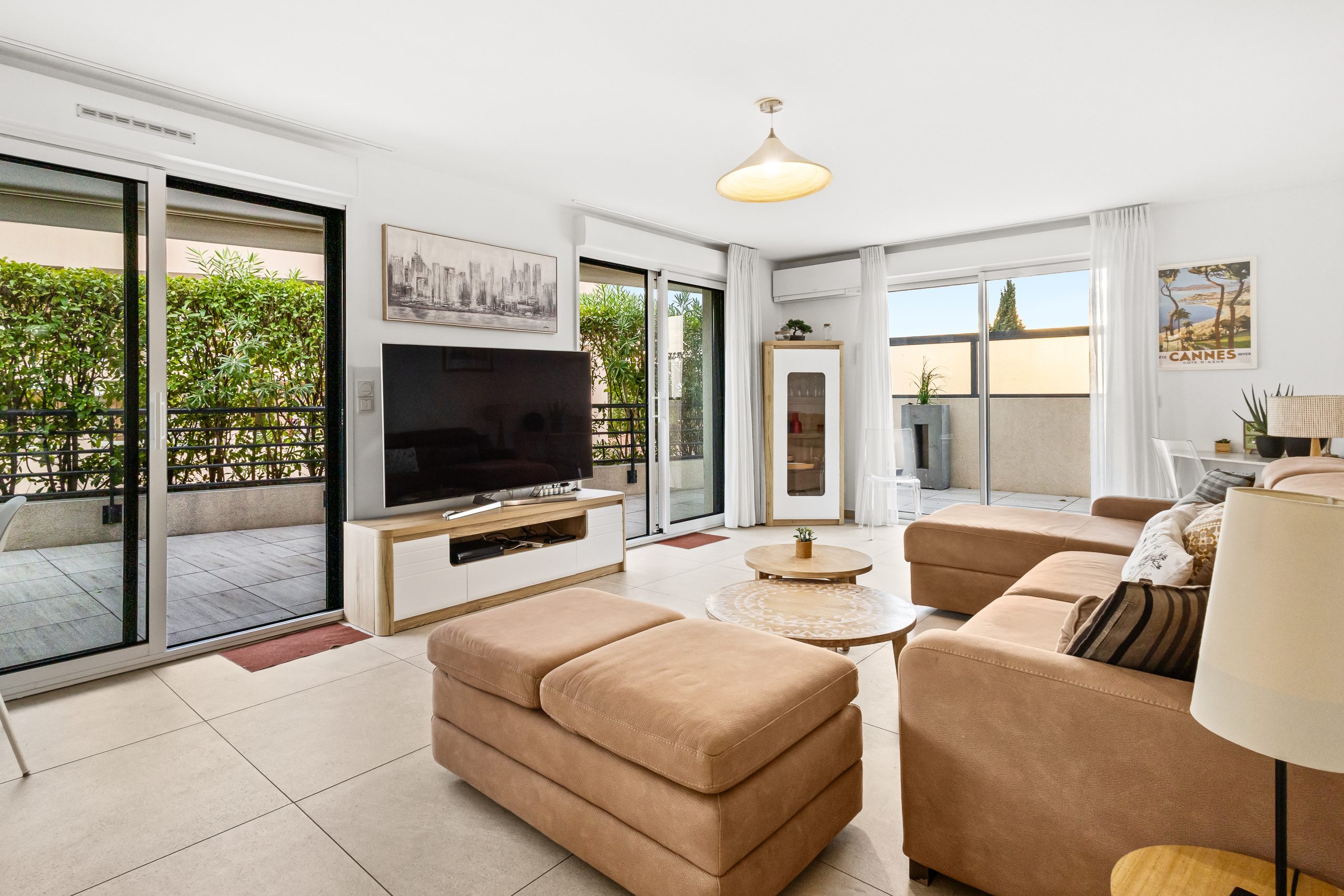 Appartement Louis - Salon ouvert sur la terrasse